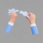 Two hands joining puzzle pieces